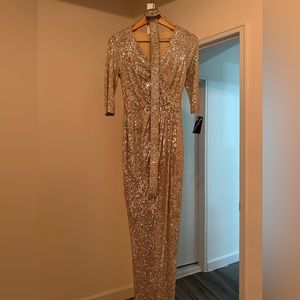 Gorgeous dress for occasions. New, with tag, never worn. Size S, XS, 0, 00